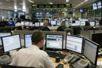 Traders at the London Stock Exchange.  Alpha Chairman Ken Costa said ...