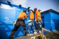 Samaritan's Purse employees work in teams to construct thousands of ...