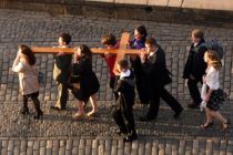A cross is carried by young people to a reception at Edinburgh Castle ...