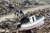 More than 10,000 people were killed in the earthquake and tsunami ...