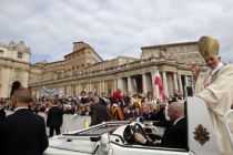 Pope Benedict XVI arrives on his popemobile to lead a Mass for the ...