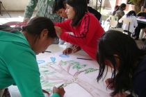 Children write and draw messages to El Salvador's government at a ...