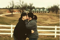 lesbian-couple-kiss-in-front-of-the-duggar-familys-residence