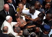 pope-francis-greeted-by-priests
