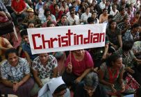 a-protester-holds-a-placard-during-a-rally-in-mumbai-by-hundreds-of-christians-against-attacks-on-churches-nationwide