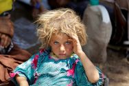 a-yazidi-girl-fleeing-islamic-state-terror-rests-at-the-iraqi-syrian-border-crossing-in-fishkhabour-dohuk