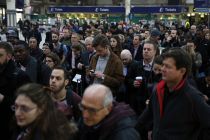 passengers-queue-at-victoria-station-london