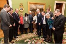 president-trump-praying-with-officials-guests