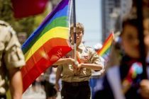 boy-scout-carrying-lgbt-rainbow-flag