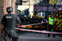 members-of-the-london-fire-brigade-stand-by-cordon-near-parsons-green-tube-station