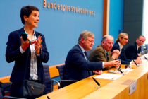 frauke-petry-chairwoman-of-the-anti-immigration-party-alternative-fuer-deutschland-afd-leaves-a-news-conference-next-to-joerg-meuthen-2nd-l-leader-of-the-party