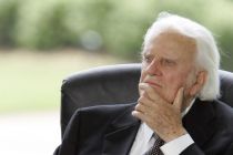 billy-graham-listens-during-a-dedication-ceremony-for-the-billy