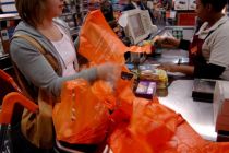 File photo dated 19/04/2007 of a woman using disposable shopping bags ...
